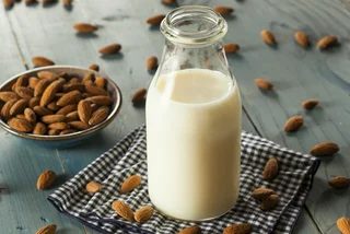 Illustrative image of almond milk via iStock / bhofack2